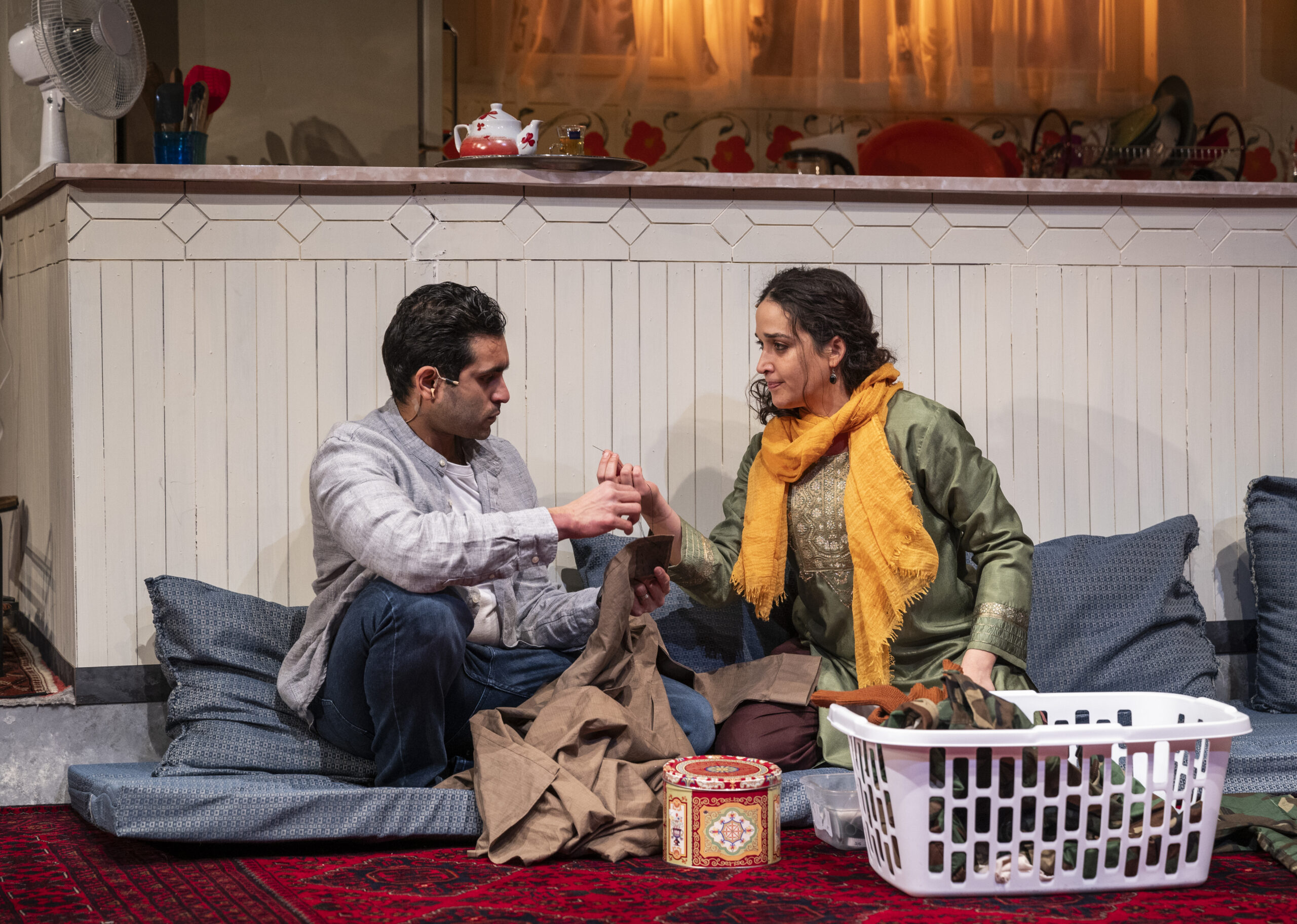 Owais Ahmed and Aila Ayilam Peck in SELLING KABUL. Photo Credit: Michael Brosilow